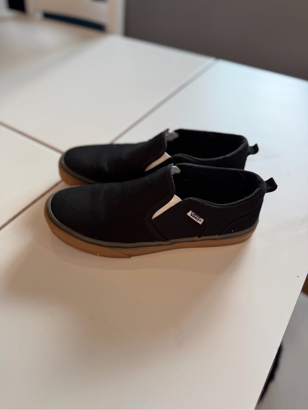 Vans Black Slip-On Sneakers with Gum Sole
